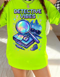 Y2K Detective Graphic Tee: Retro Sleuth Mystery Shirt Crime Fan Gift Unisex Cotton Apparel