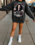 May include: Dark gray sweatshirt featuring a graphic design with a woman's portrait, roses, and the text "LOVE BITES BACK". The design includes a photo and the words "Choose wisely" and "Forks". The sweatshirt is worn by a person.