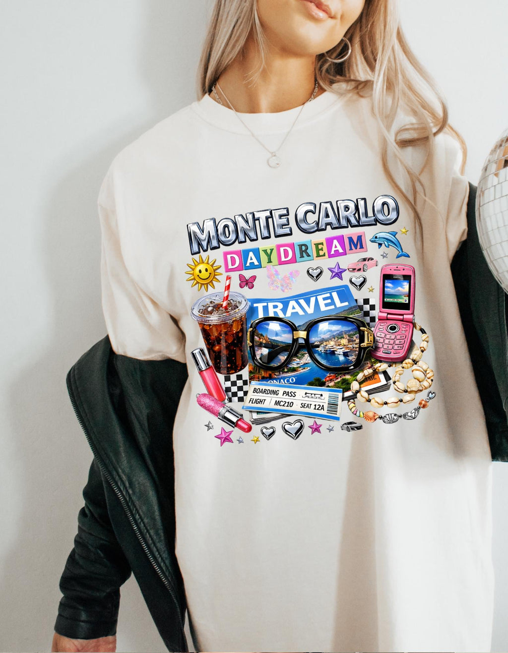 Monte Carlo Daydream travel collage T-shirt | sunglasses, cassette, flip phone