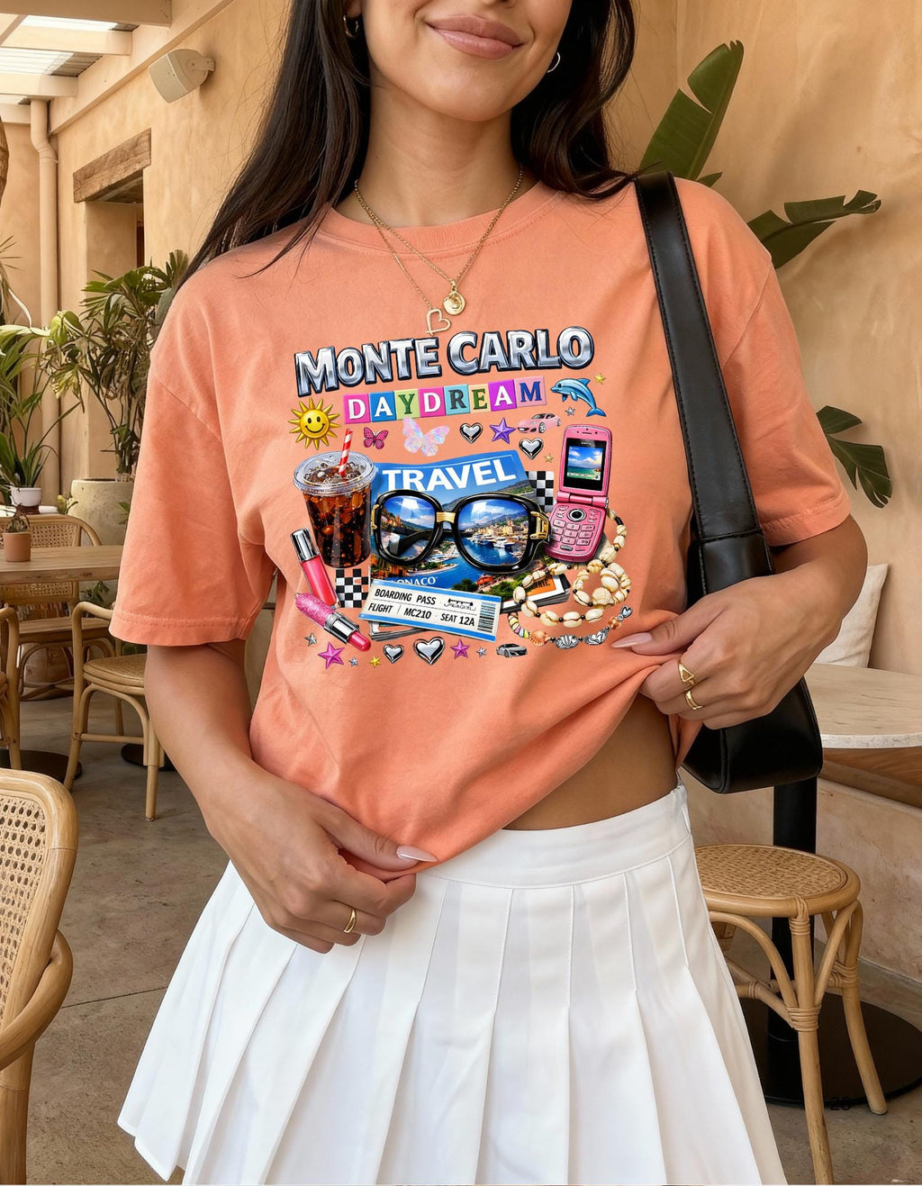 Monte Carlo Daydream travel collage T-shirt | sunglasses, cassette, flip phone