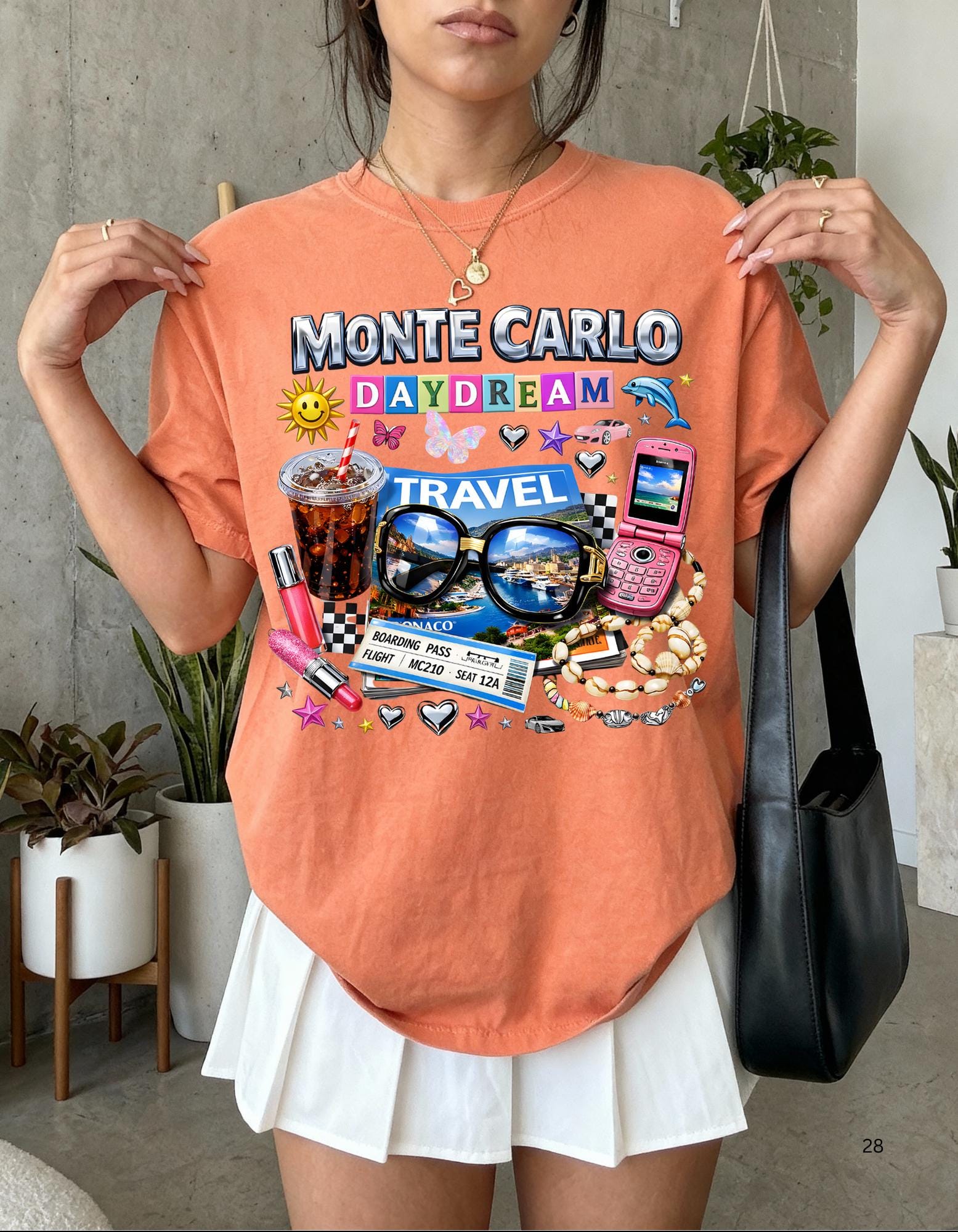 Monte Carlo Daydream travel collage T-shirt | sunglasses, cassette, flip phone